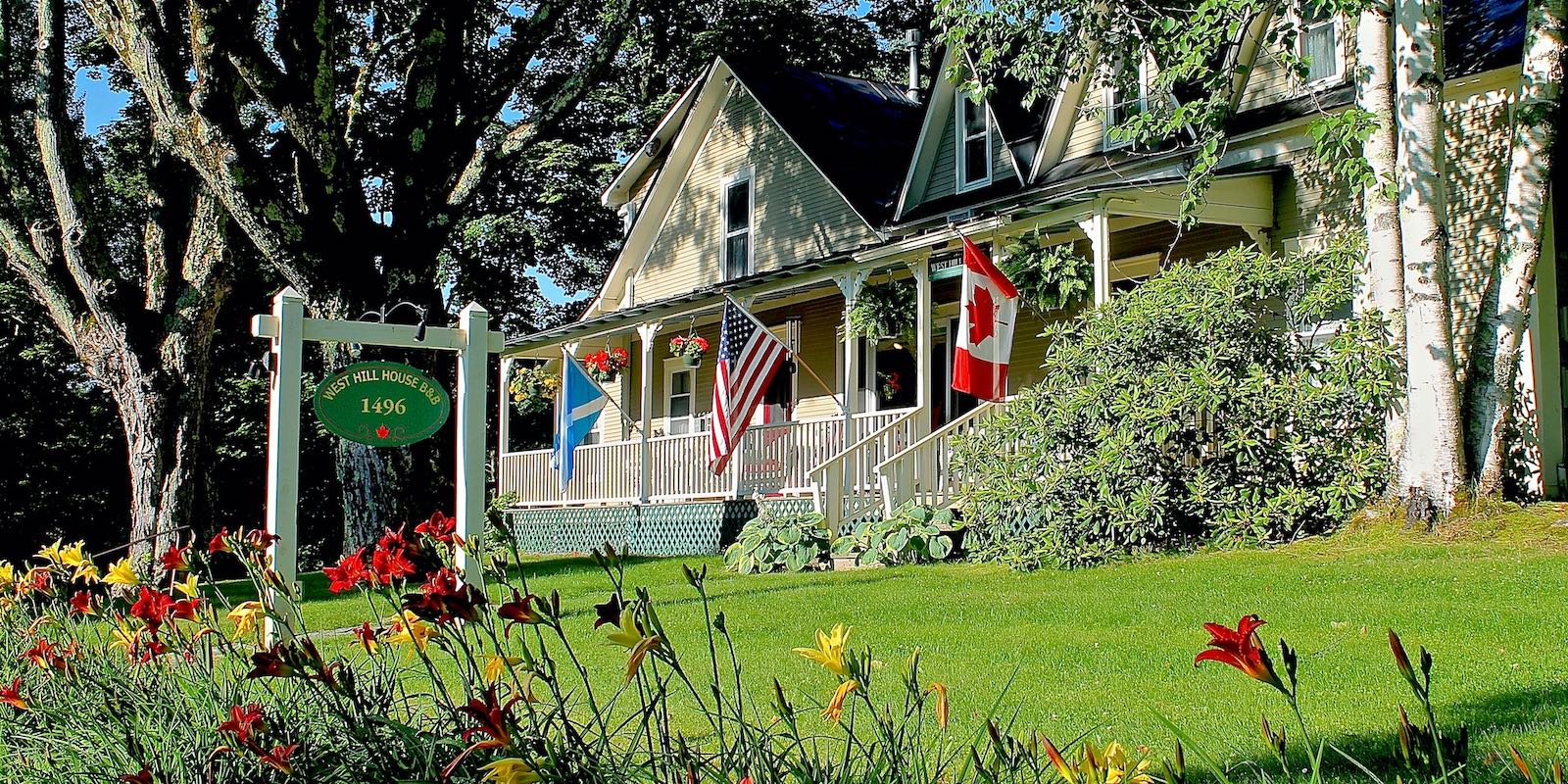 West Hill House B&B exterior surrounded by Vermont gardens
